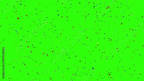 Animation of colorful paper particles falling on a green screen, celebration and festival party concept
