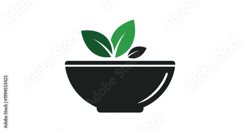 Healthy food bowl concept with green leaves representing freshness and organic ingredients