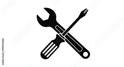 A crossed wrench and screwdriver depicted in a simple black silhouette
