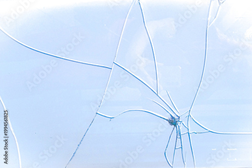 Light blue background with a cracked glass effect. Space for text and advertising. Copy space 