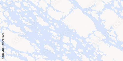 Aerial view of a winding light blue river system with islands