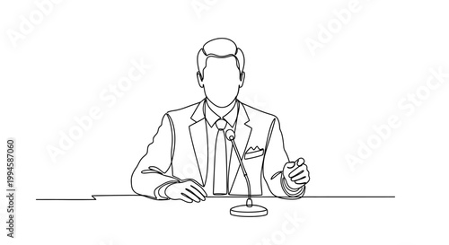 Businessman sitting at a table drinking.