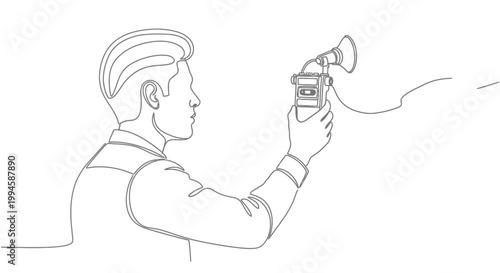 Man holding old style camera device.