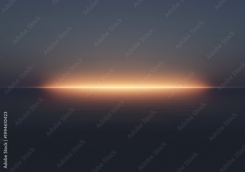 Fototapeta premium Sunrise over calm ocean water with a dark blue sky and warm light