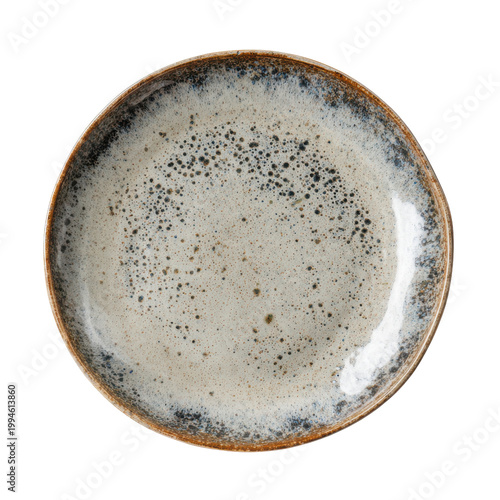 Rustic ceramic plate with speckled glaze and brown rim on black image