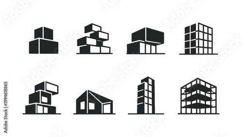 Minimal black silhouette set of modern building icons, including stacked cubic houses, tower blocks, and skeletal high-rise structures on white