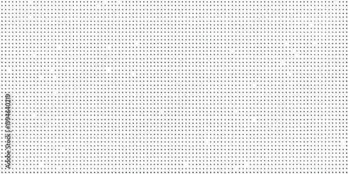 Abstract pattern of small uniformly distributed dark dots on a white background