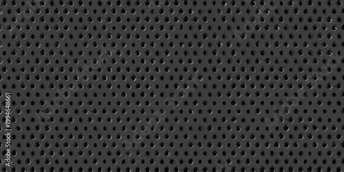 Dark gray perforated metal panel with a repeating hole pattern