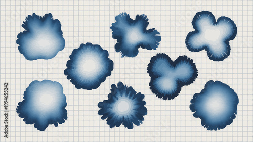 An abstract arrangement displays seven unique blue inkblot shapes on a light gray grid background appearing fluid and organic high quality professional detailed modern elegant stylish