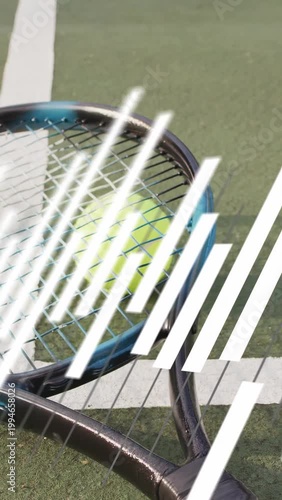 Vertical video: Diagonal bars sweeping causing camera pan showing blue racket with neon ball focus