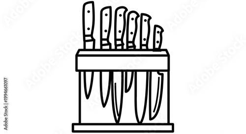 Set of kitchen knives on block.