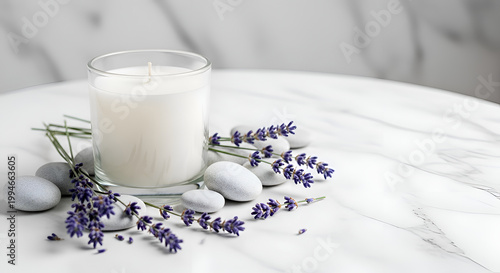 Lavender candle on marble table top.