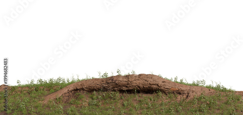 Photos A panoramic image of a natural, outdoor scene featuring a large mound with a cav