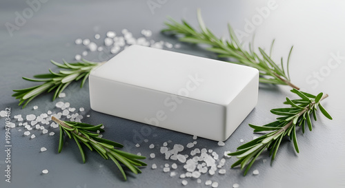 White soap bar with rosemary and salt.