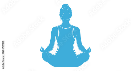 Blue silhouette of woman meditating in lotus pose