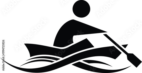 Black silhouette of person rowing a canoe on water surface