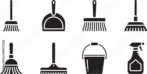 A set of eight black and white cleaning tool including brooms dustpan bucket and spray bottle