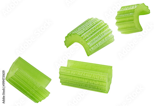 Falling Celery pieces  isolated on white. Explotion of Fresh celery ribs. Flying celery stalks  Top view. Flat lay