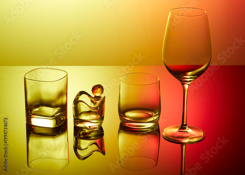 Glasses, ball  and ashtray on mirror