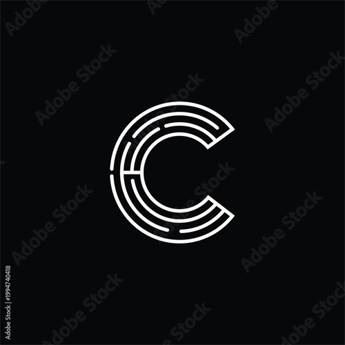 Abstract maze letter c design on black background