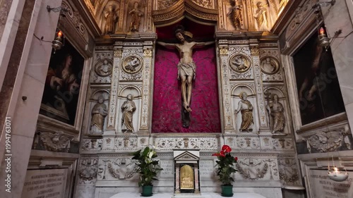 Crucifix On Red Background In Santa Maria Della Pace Rome