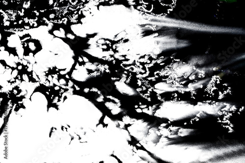 Abstract grunge black ink paint distressed texture rips tears and rust transparent crumpled industrial overlay background