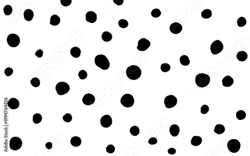A seamless pattern of large and small black polka dots. 