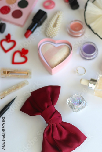 Various accessories and beauty products on white background. Coquette aesthetic. Selective focus.