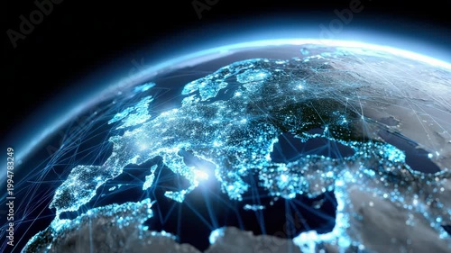 Aerial tracking shot of illuminated globe rotating to reveal digital network connections and city lights across europe and north africa