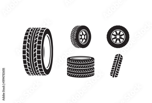 New stack of black rubber car tires and auto wheels with detailed tread isolated on a white background for vehicle transport