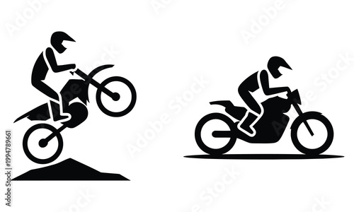 Motocross rider performing wheelie and balancing on flat ground