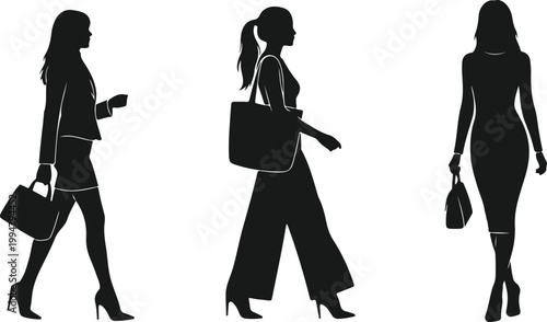 Silhouettes of business women walking with handbags