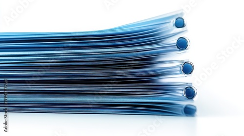 Stack of Blue Document Files with Clear Plastic Covers Showcasing Professional Organization