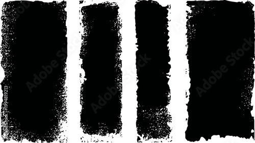 Set of black grunge paint brush strokes with rough textured edges on white background