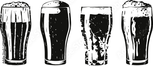 Four different types of beers in tall glasses with foam, dark and light brews, alcoholic beverage variety