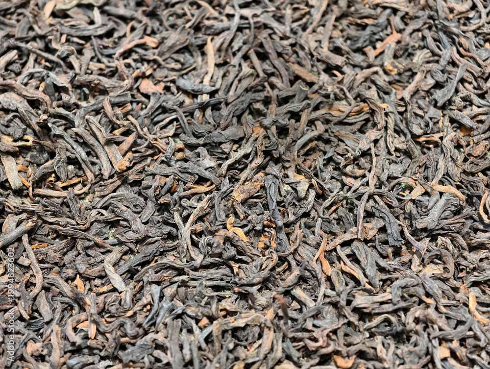 Fototapeta premium Full frame close-up of dried black tea leaves