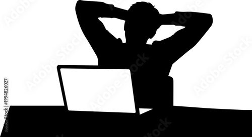 Freelancer working late night silhouette.