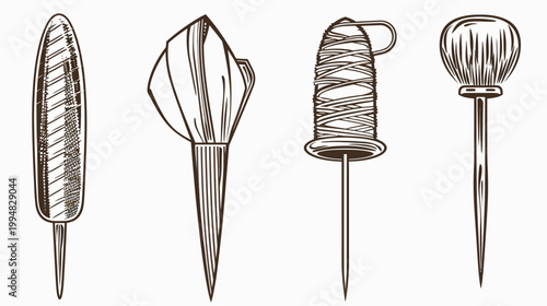 Four pins of different styles, each with unique design, in a vintage engraved style