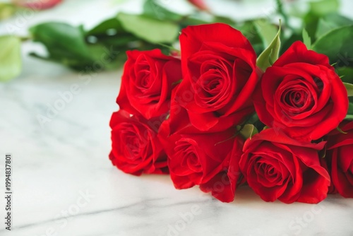 Roses Placed on a Marble Surface With a Colorful Background in a Simple Arran...