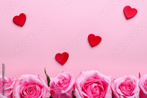 Roses and Red Hearts on Pink Background for Romantic Occasions and Celebrations