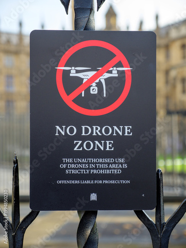 No Drone Zone sign on the gates surrounding the Houses of Parliament, Westminster, central London, UK