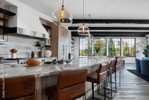 Modern Kitchen Design With Large Windows and Bar Seating in a Home