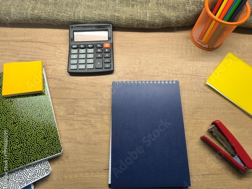 Stationery items laid out on a flat background. Education concept.