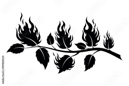 Silhouette of a burning tree branch with flames and leaves