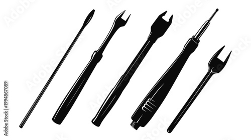 Silhouetted tools on white background, various shapes and sizes. Hand tools for a project