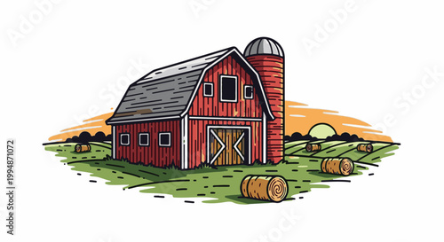 Red barn with silo and hay bales in a field during sunset