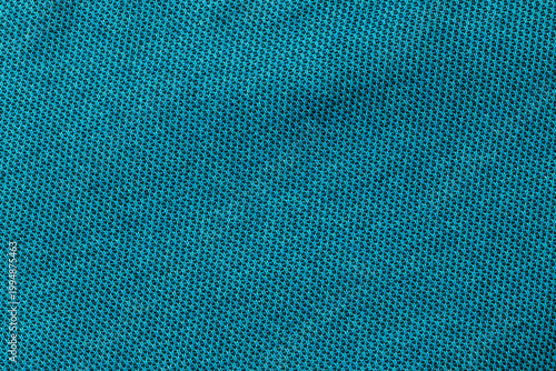 Bild auf Leinwand Textile detail showing a close up of a blue fabric with a mesh pattern used in c