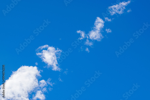 Blue sky with beautiful white fluffy clouds, natural blue skyscape, cloudscape with copy space. Scenic beauty of nature of Leh, Ladakh, India. Ladakh is known for clear atmosphere, bright environment.