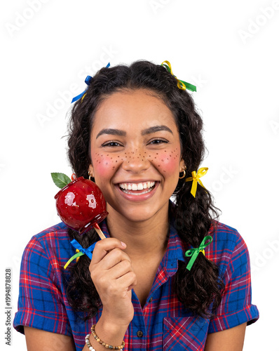 Smiling Young Woman Holding Candy Apple at Junina Party