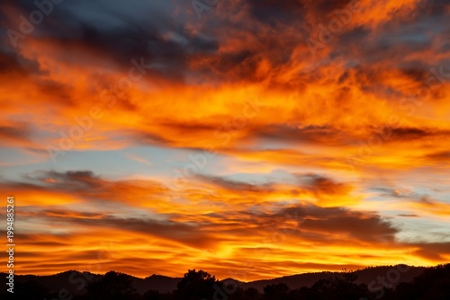 Colorful Sky During Sunset in a Mountainous Area With Clouds